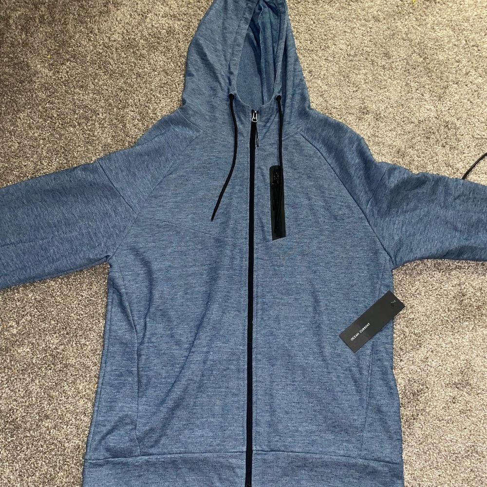 Ocean current zip up jacket with hood, pockets, and side zip up pocket